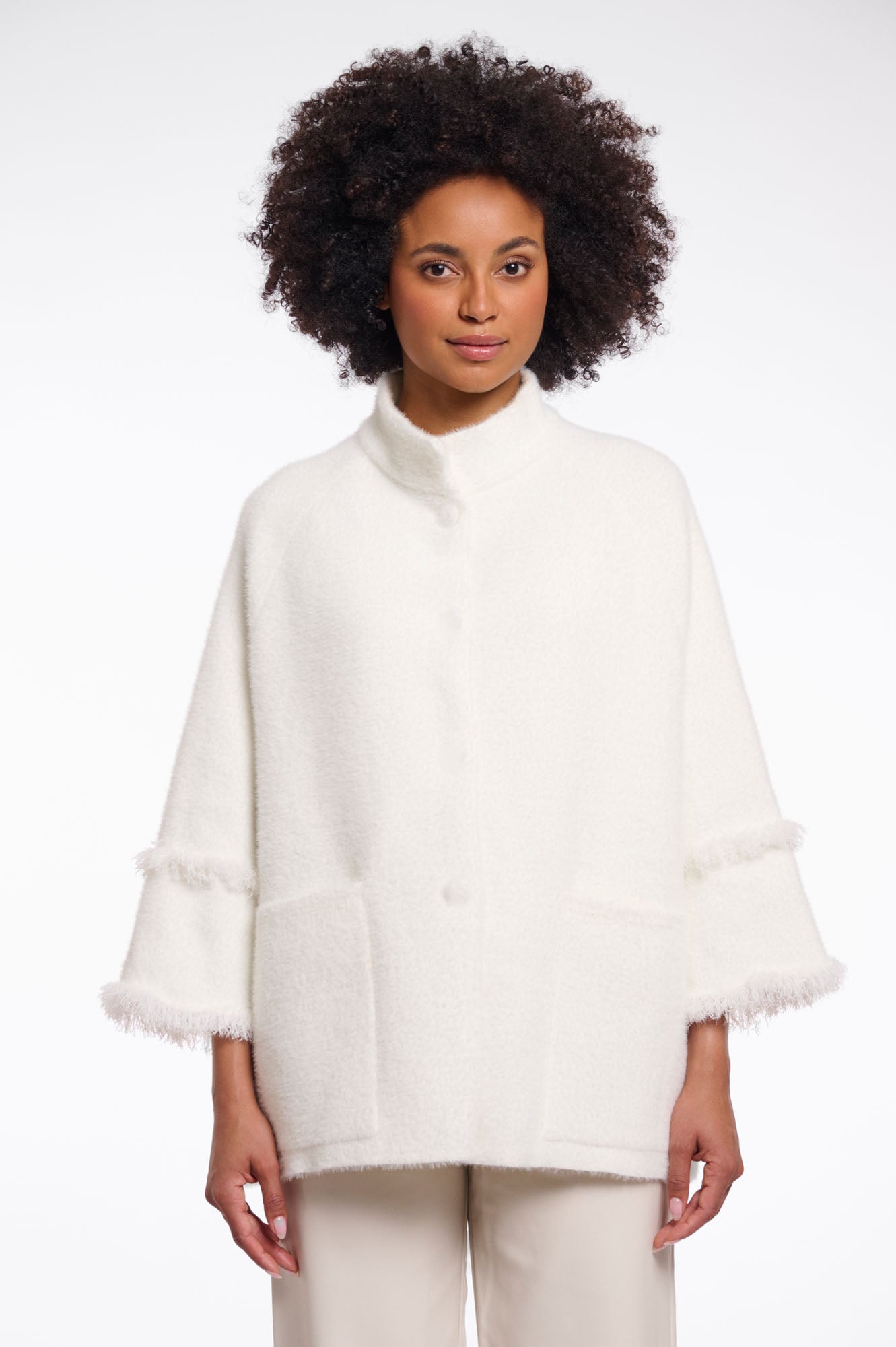 Cape with fringe details