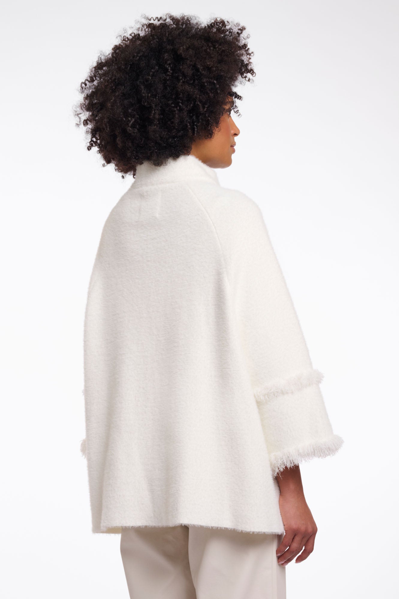 Cape with fringe details