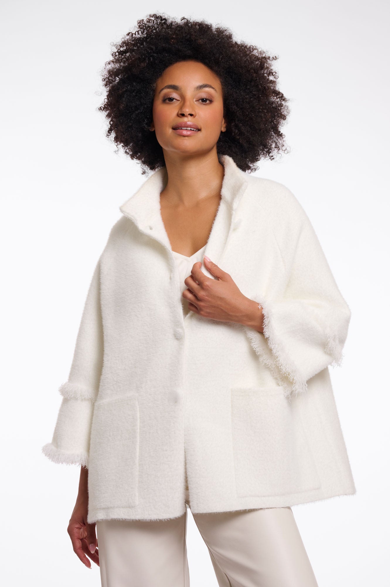 Cape with fringe details